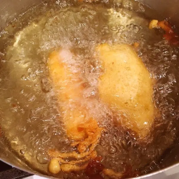 Fish frying in oil