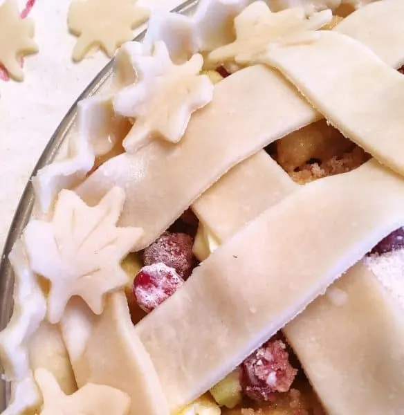 Placing dough leaves and acorns around the edges