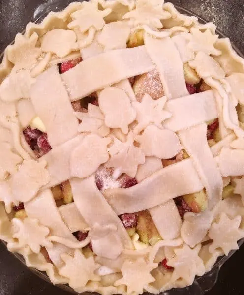 Cranberry Apple Pie brushed with milk and sprinkled with sugar