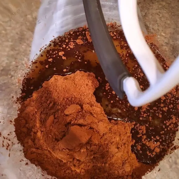 Mixing bowl with melted butter, cocoa, and sugar