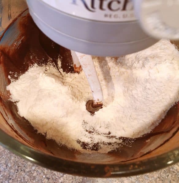 Flour being added to brownie batter