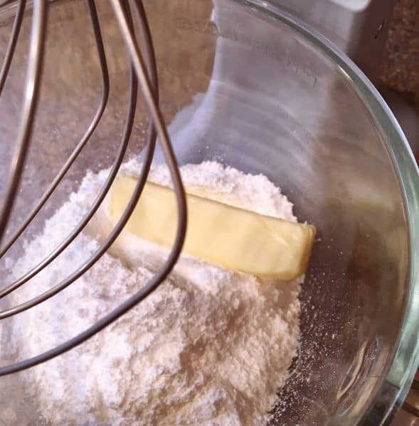 Softened butter and powder sugar for frosting