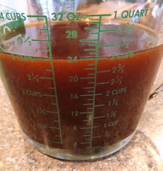 Sauce in measuring cup