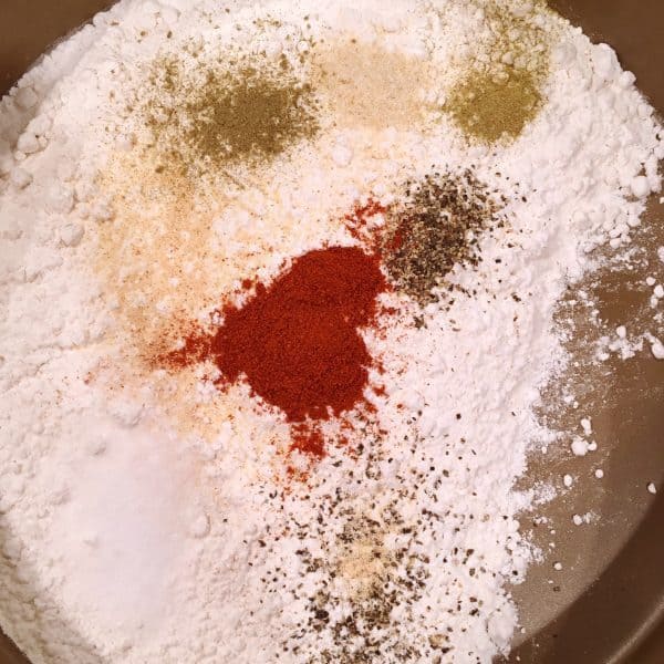 Flour and seasonings in pan