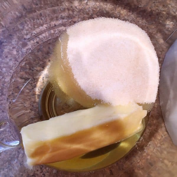 Mixing bowl with sugar, oil and butter