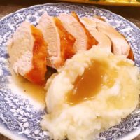 Turkey gravy over mashed potatoes and turkey
