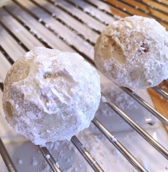 Snowball cookies after first coating of powder sugar