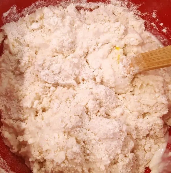 Mixing wet and dry ingredients for biscuits