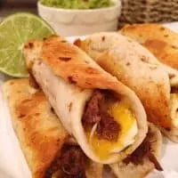 Plate full of Oven Fried Mini Flautas