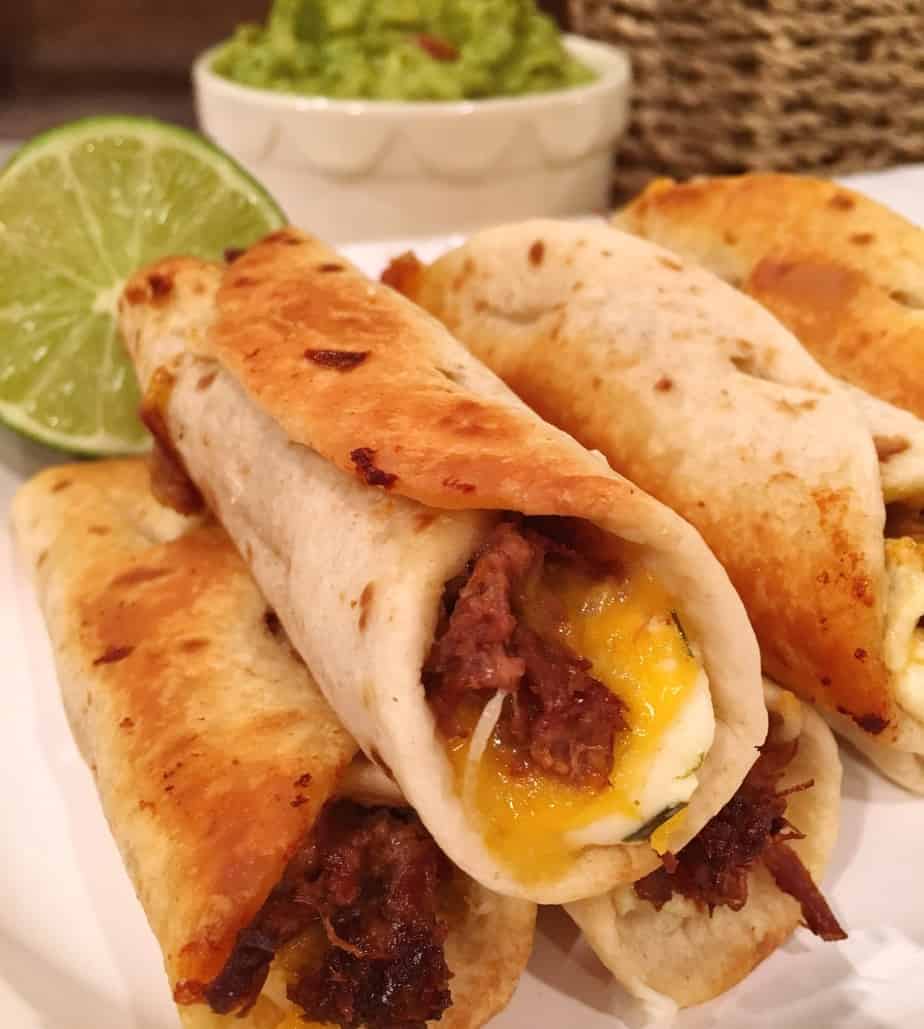 Plate full of Oven Fried Mini Flautas