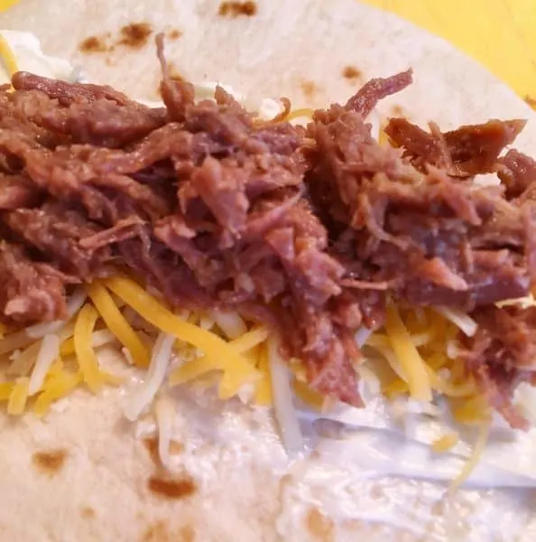 Seasoned beef on the tortillas