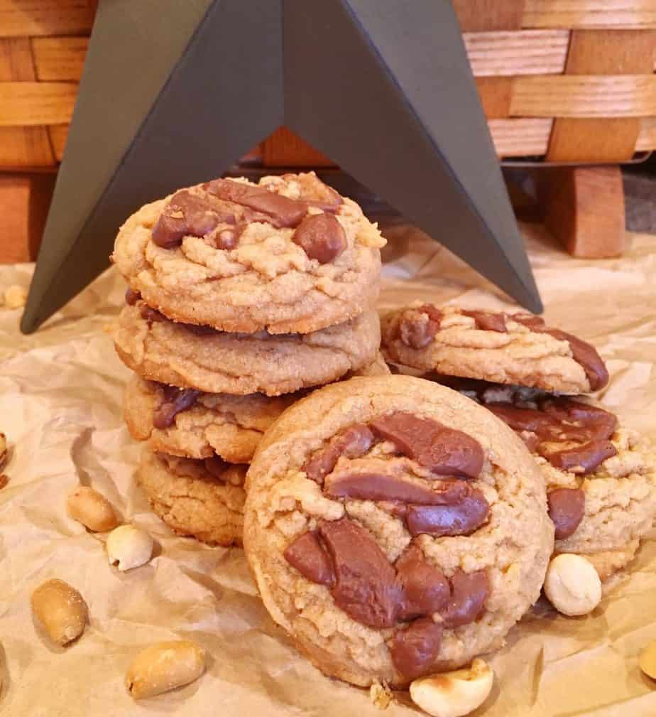 Reese's Peanut Butter Cup Cookies in a stack with peanut surrounding them.