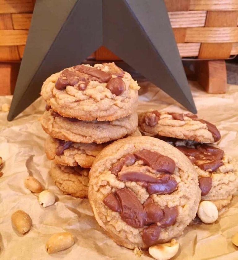 Reese's Peanut Butter Cup Cookies in a stack with peanut surrounding them.