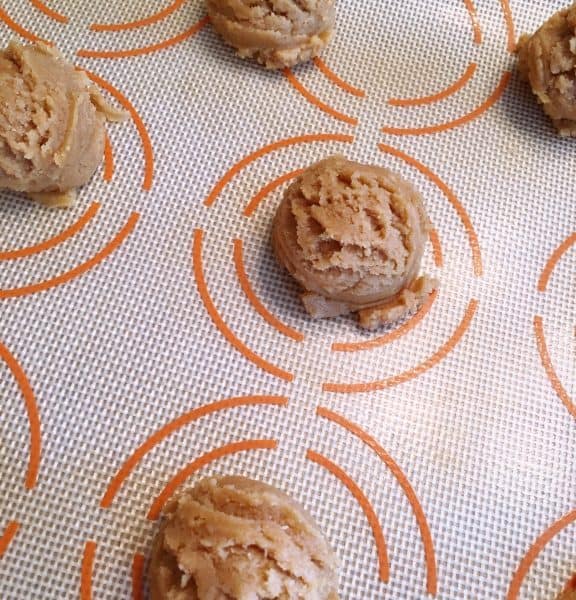 dough scooped onto baking mat.