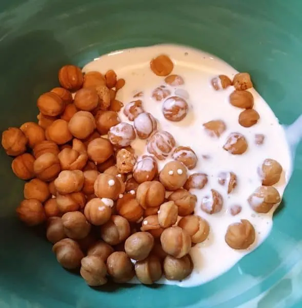 bowl with caramel bits and whipping cream