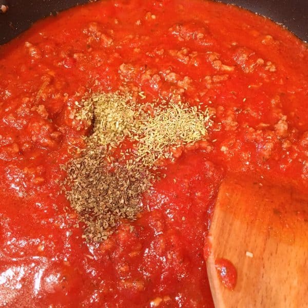 Adding seasoning to sauce