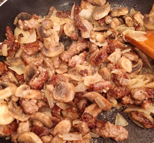 Adding mushrooms and onions back into the dish