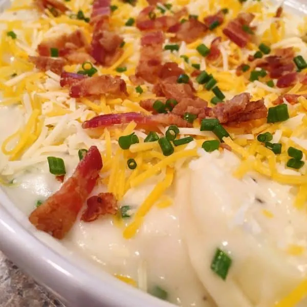 Ready for the oven dish of loaded scalloped potatoes