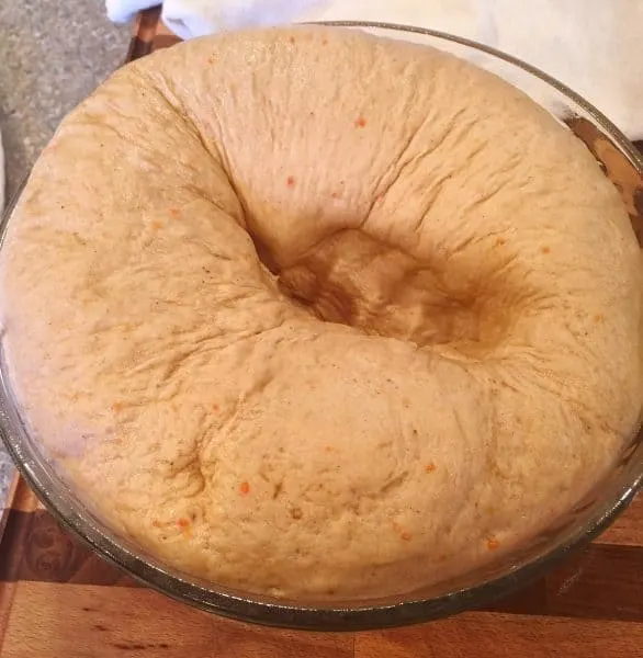 Carrot Cake Mix Cinnamon Roll raised dough punched down.