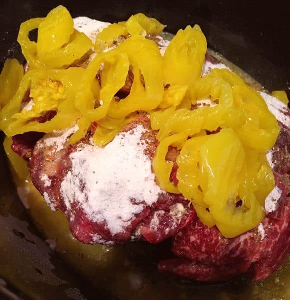 Adding Banana Peppers to Mississippi Pot Roast.