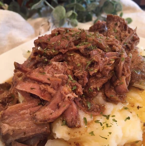Mississippi Pot Roast with Garlic Cheddar Mashed Potatoes and Gravy.