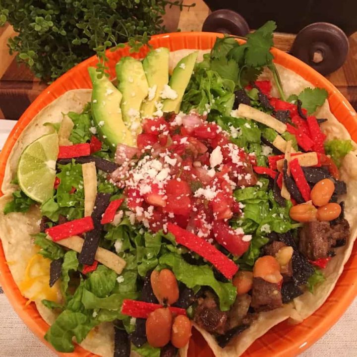 Beautiful bowl full of steak fajita taco salad