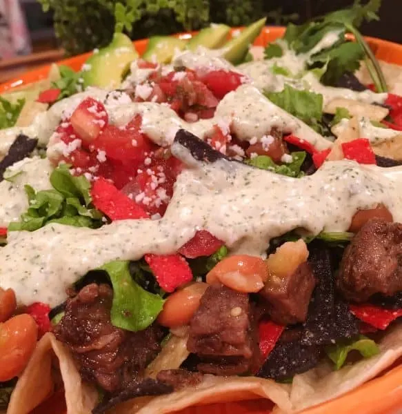 Steak Fajita Taco Salad with Cilantro Cotija Cheese dressing