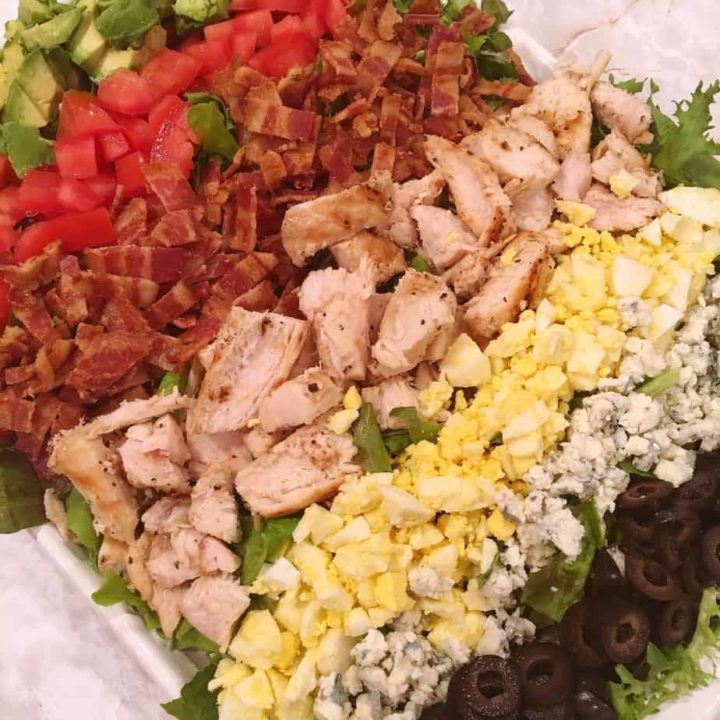 Platter full of Grilled Chicken Cobb Salad