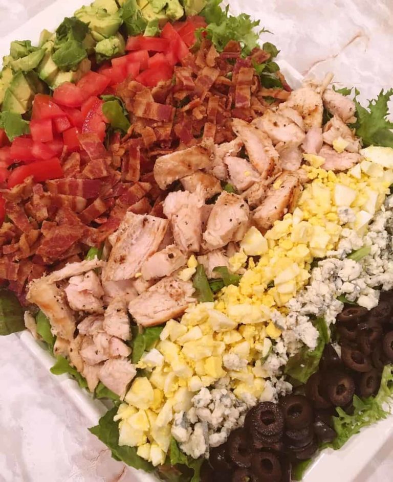Platter full of Grilled Chicken Cobb Salad.