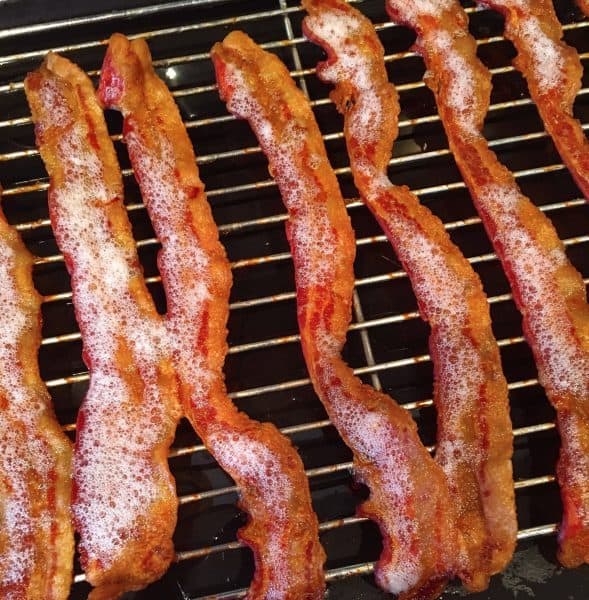 Bacon baked on rack in oven for Classic Cobb Salad