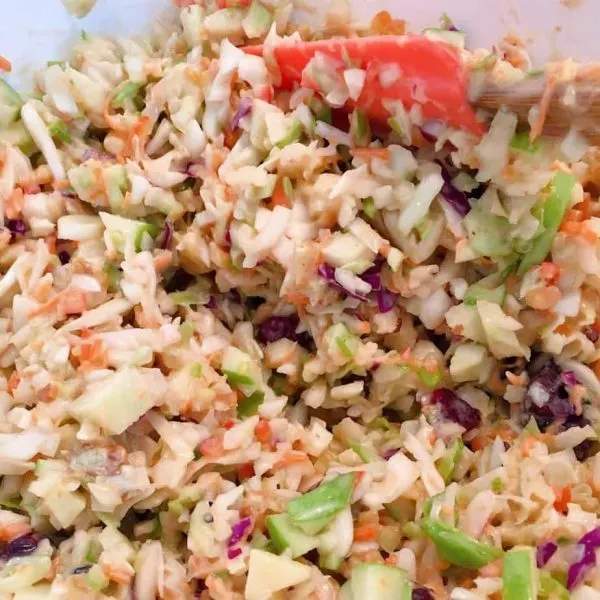 Apple Slaw in a bowl coming together for apple slaw