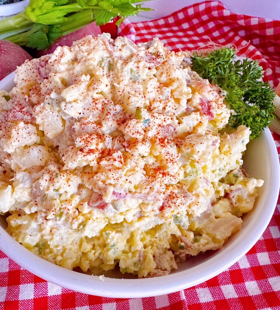 Close-up photo of creamy red potato salad.