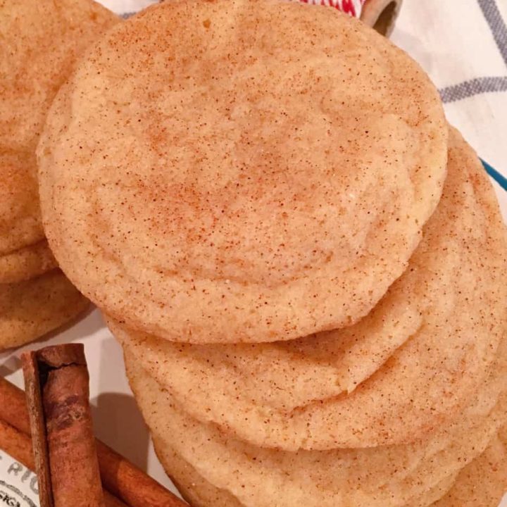 Snickerdoodles on a plate with cinnamon