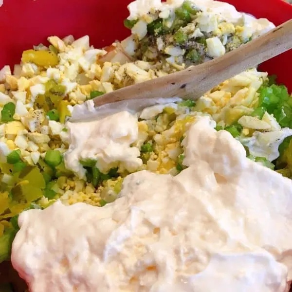 Adding Mayonnaise to potato salad 