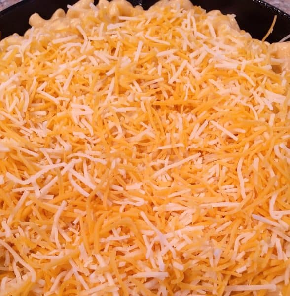 Additional cheese on top of macaroni and cheese