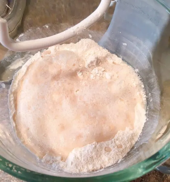 Dry ingredients and wet ingredients being mixed together 