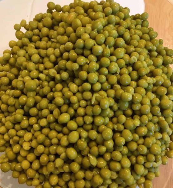 Drained Peas Added to nuts and pickles in mixing bowl