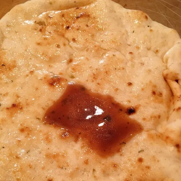 Balsamic Dressing on top of naan bread