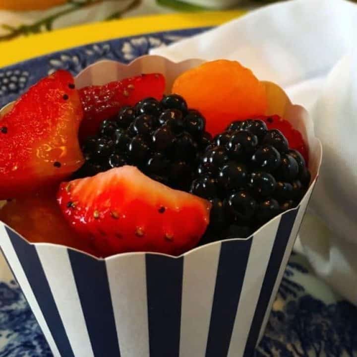 Small cup of Fresh fruit salad with poppy seed dressing