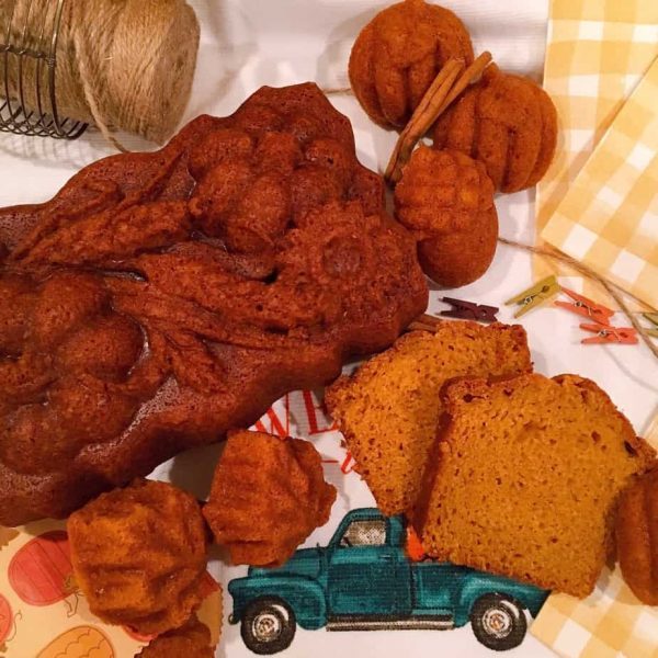 Pumpkin bread and muffins on mat