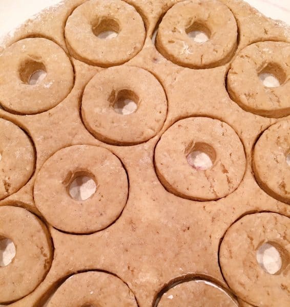 donuts cut out with holes on a board