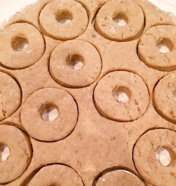 donuts cut out with holes on a board