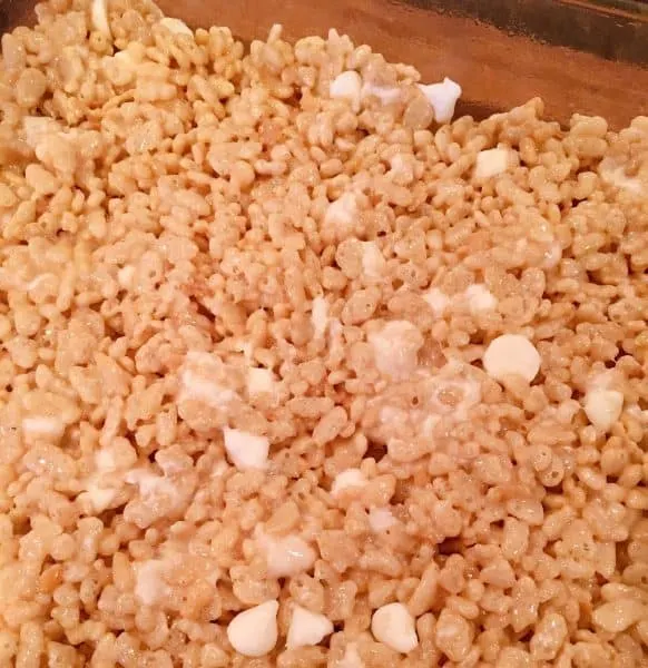 Rice Krispie Mixture poured into glass baking dish