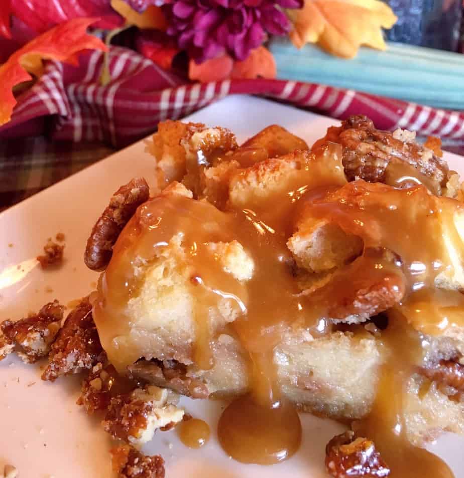 Slice of Pecan Pie Bread Pudding with drizzle of Salted Caramel Sauce