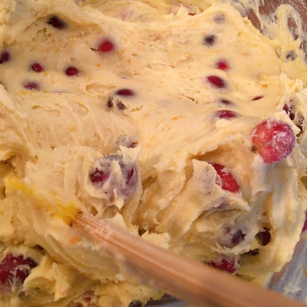 placing cake batter in baking pan