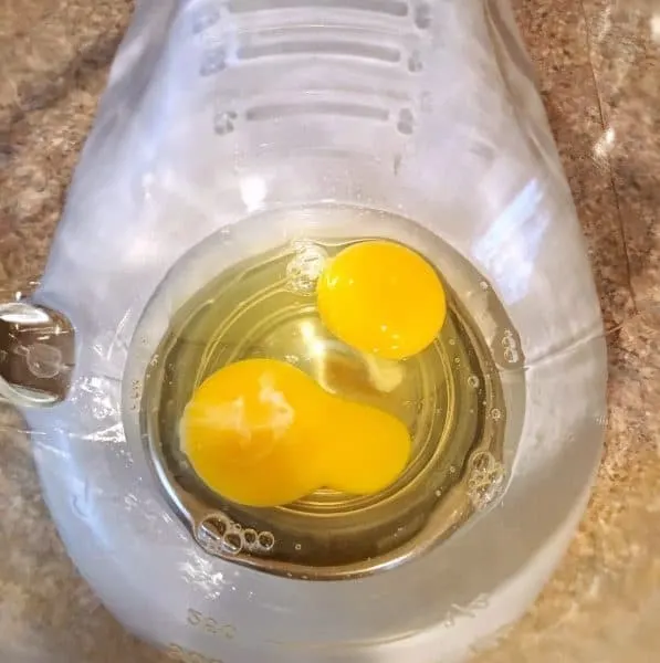 eggs in mixing bowl of mixer