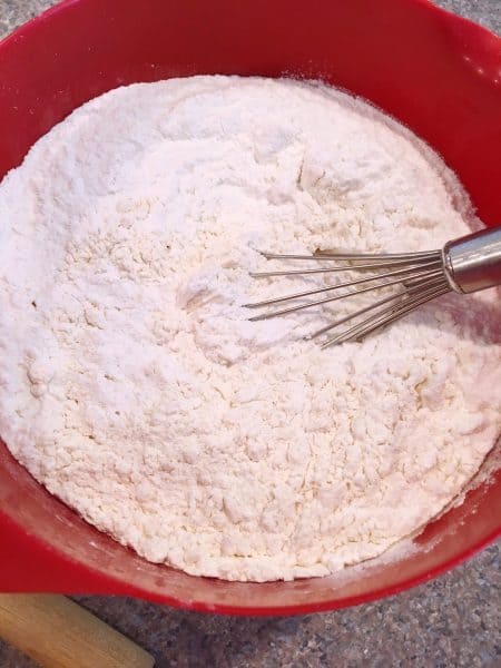 Flour and rice flour combined in mixing bowl