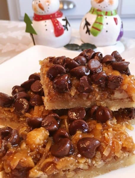 Stacks of easy chocolate caramel-pecan bars 