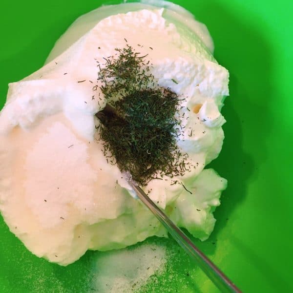 sour cream, dill weed, sugar, and salt in a bowl