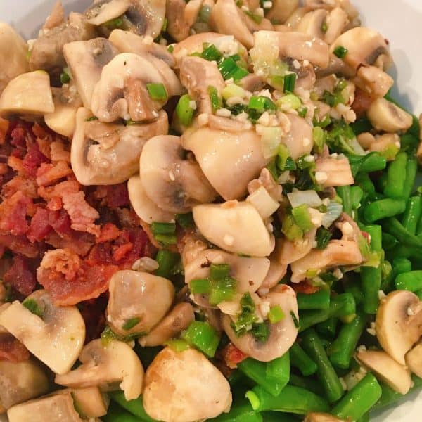 Adding mushroom mixture to green beans